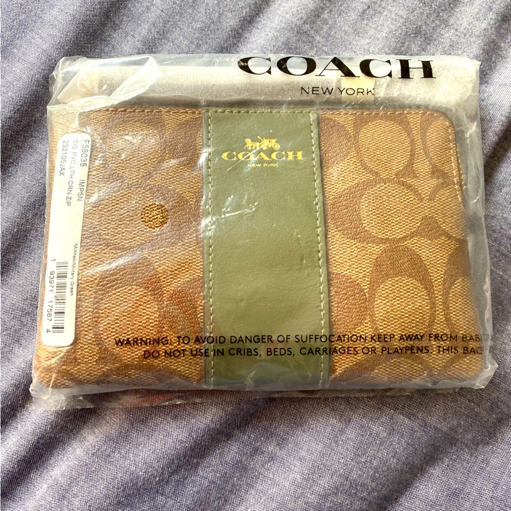 Brand New Unopened Coach Wristlet.